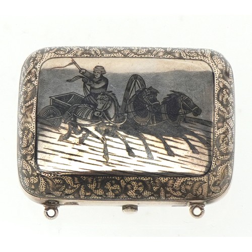 3596 - A Russian silver niello work box decorated with a three horse drawn troika, standard 84, 6.4cm wide,... 