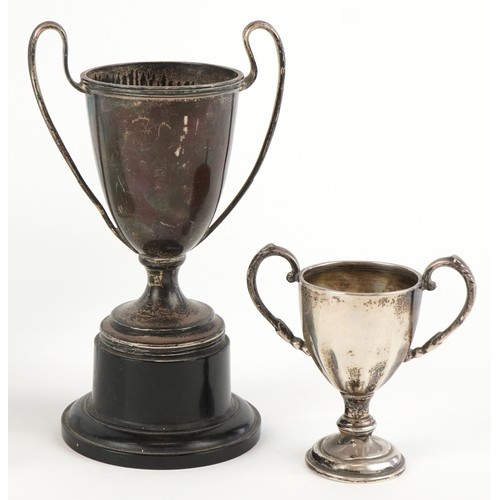 3641 - Antique and later silver comprising two twin handled trophies, a Dutch caddy spoon and set of 830 gr... 