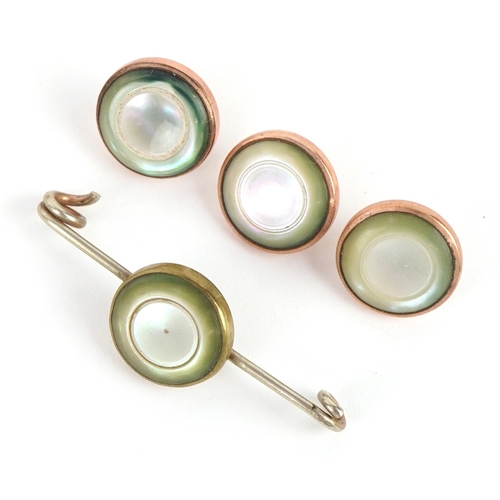 1044 - A set of four gold plated and mother-of-pearl hatpins, buttons and a broken brooch, the pins 24.5cm ... 