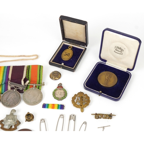 2647 - British military World War I and World War II medals and militaria including a medal group with Indi... 