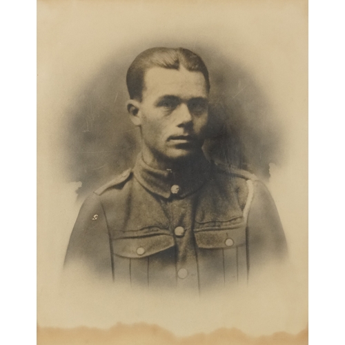 2778 - Head and shoulders photographic print of a soldier, framed and glazed, 50cm x 40cm.