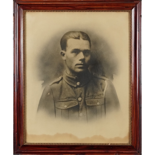2778 - Head and shoulders photographic print of a soldier, framed and glazed, 50cm x 40cm.