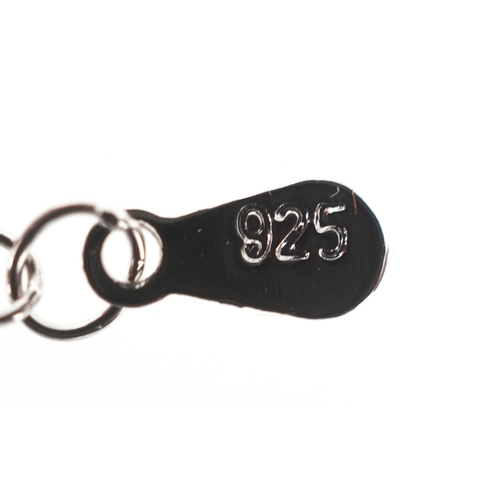 3435 - A silver infinity jewellery suite set with clear stones comprising necklace, bracelet and stud earri... 