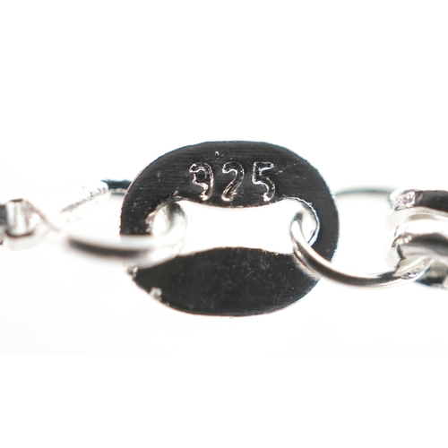 3451 - A silver and pink cat's eye pendant on chain and matching stud earrings in the form of cat heads, th... 