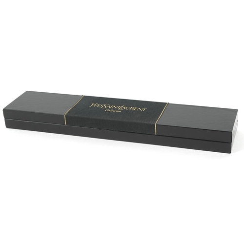 3394 - Yves Saint Laurent, a ladies quartz wristwatch with box and paperwork, the case numbered 505937, the... 