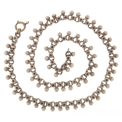 3268 - Silver jewellery comprising a Past Times Celtic design bangle, two eternity rings and a Middle Easte... 