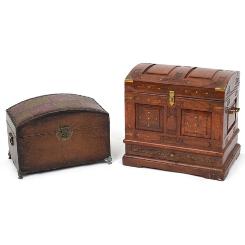 2048 - An Indian camphor and brass bound dome topped trunk, late 20th century, with wire work inlaid decora... 