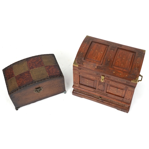 2048 - An Indian camphor and brass bound dome topped trunk, late 20th century, with wire work inlaid decora... 