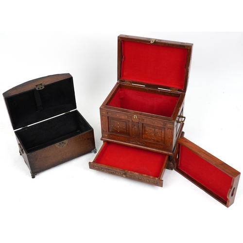 2048 - An Indian camphor and brass bound dome topped trunk, late 20th century, with wire work inlaid decora... 