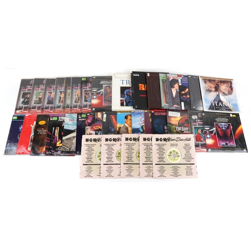 2625 - A collection of laser disc extended play film sound tracks including The Rambo Trilogy, Disney's Tro... 