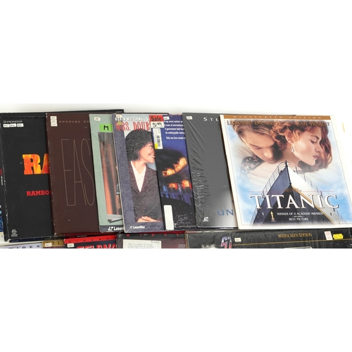 2625 - A collection of laser disc extended play film sound tracks including The Rambo Trilogy, Disney's Tro... 