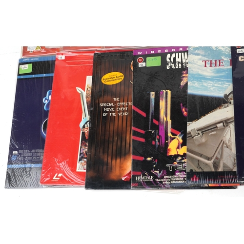 2625 - A collection of laser disc extended play film sound tracks including The Rambo Trilogy, Disney's Tro... 