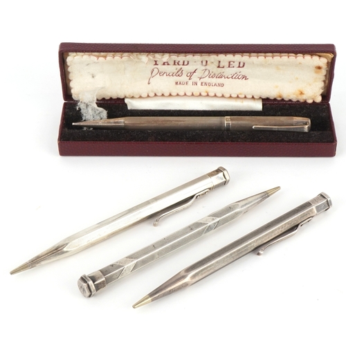 73 - Four engine turned silver propelling pencils including Yard-O-Led, the largest 12.5cm in length.