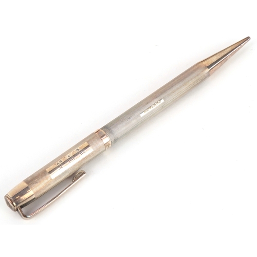 73 - Four engine turned silver propelling pencils including Yard-O-Led, the largest 12.5cm in length.