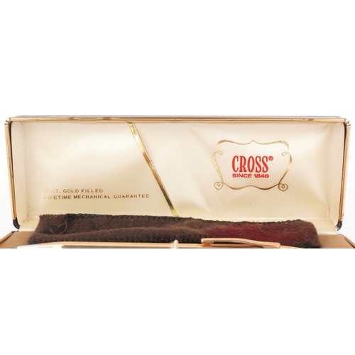 85 - Six gold plated and yellow metal propelling pencils, some with engine turned decoration including Cr... 