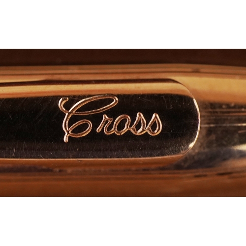 85 - Six gold plated and yellow metal propelling pencils, some with engine turned decoration including Cr... 