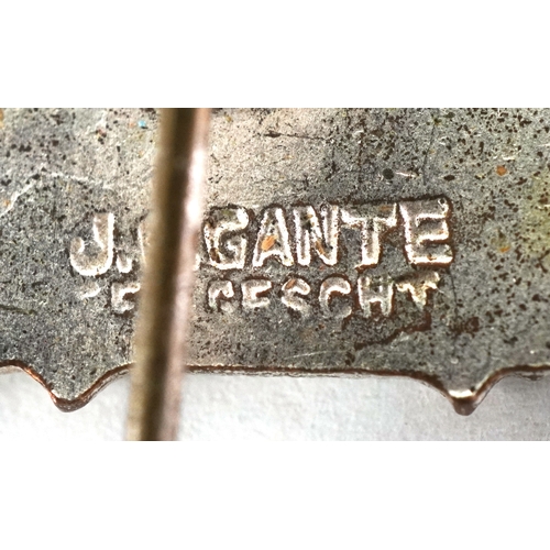 2743 - A collection of German military interest cap badges and pins etc