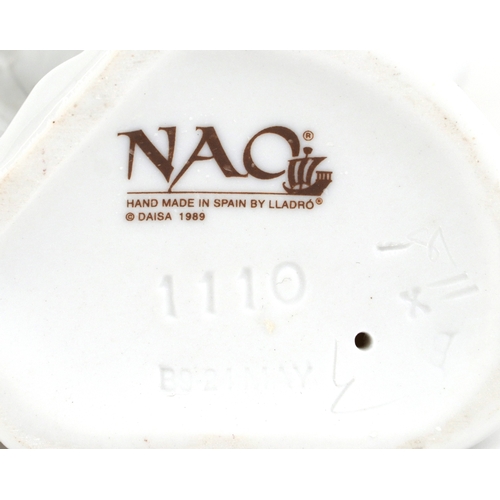 655 - Four Nao porcelain figures including a boy and girl in nightclothes, the largest 27cm high.