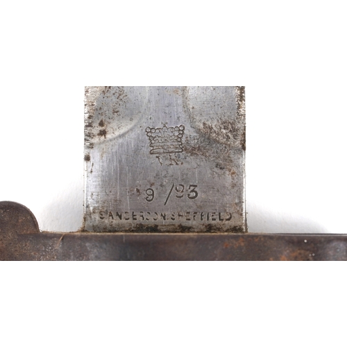 2852 - A British military issue War Department bayonet and scabbard, impressed marks to the blade, 44cm in ... 