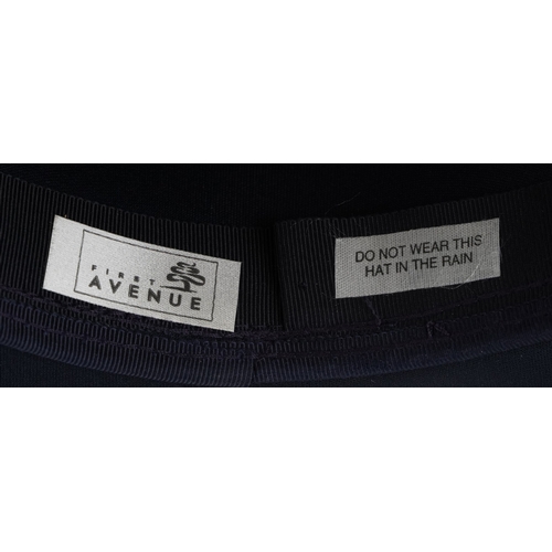 1030A - Three vintage ladies hats in a hatbox.