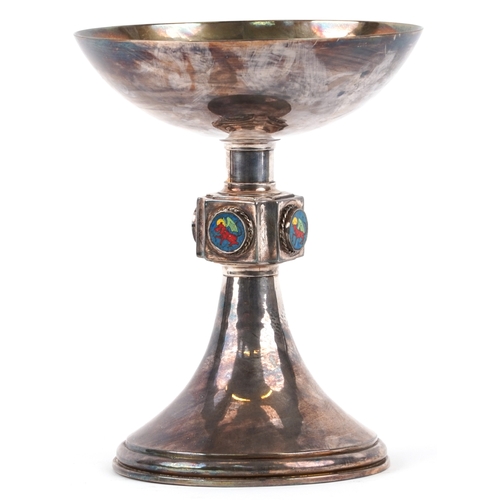212 - An ecclesiastical silver plated chalice having enamelled panels with religious icons, 22cm high.