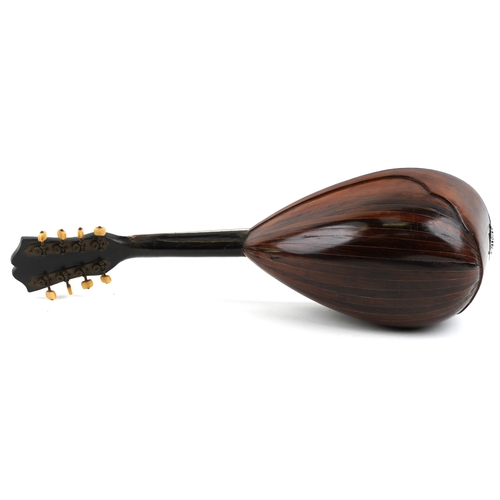 2581 - An early 20th century rosewood mandolin with bone tuning handles and mother of pearl fret markers, 6... 