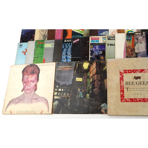 2631 - A collection of vinyl LP records including David Bowie Aladdin Sane, The Rise & Fall of Ziggy Stardu... 