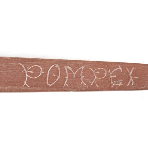 80 - A set of three lava cameo writing instruments comprising two pencils and letter opener carved with c... 