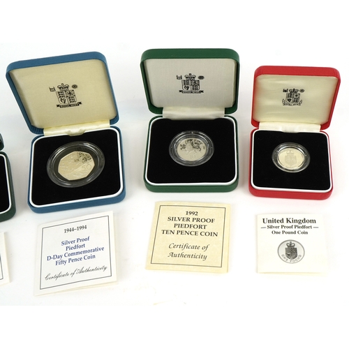 1148 - Five Royal Mint silver proof Piedfort silver coins including two one pound coins, fifty pence commem... 