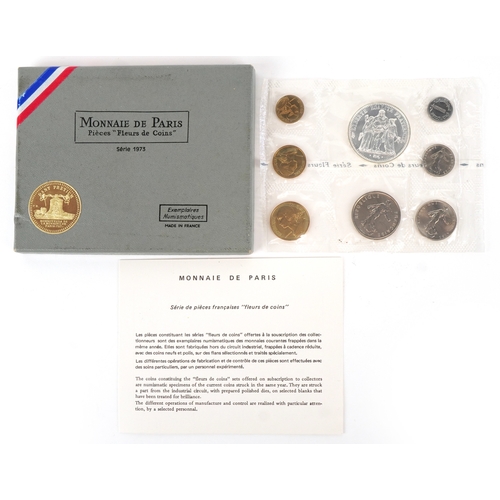 1151 - A French 1973 eight coin set including a 900 grade silver ten francs, housed in a plastic sleeve wit... 