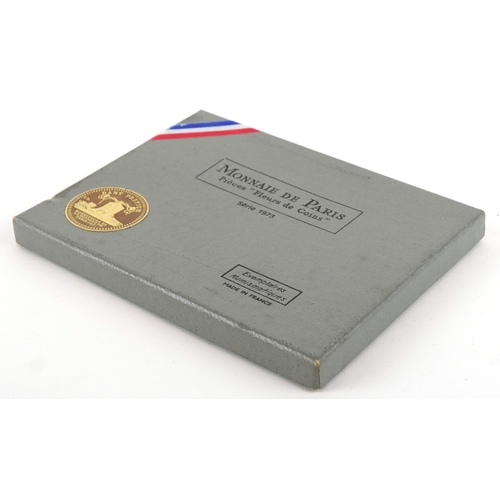 1151 - A French 1973 eight coin set including a 900 grade silver ten francs, housed in a plastic sleeve wit... 