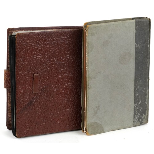 1297 - Two albums of 20th century black and white photographs, one album predominantly Suez views and shipp... 