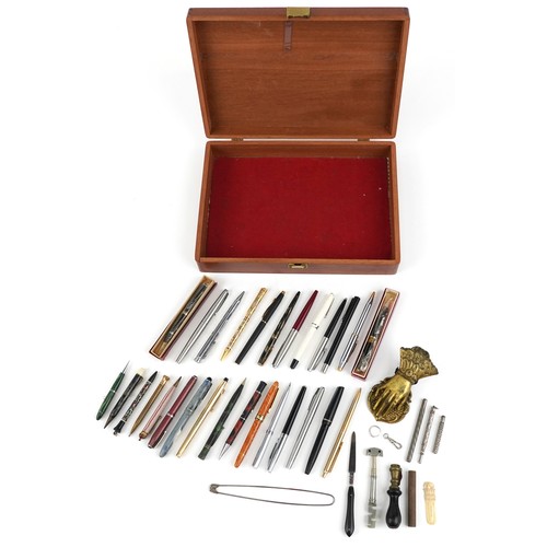 66 - Vintage and later fountain pens and ballpoint pens including Cross, Osmiroid and Conway Stewart.