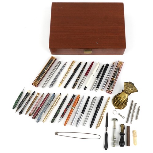 66 - Vintage and later fountain pens and ballpoint pens including Cross, Osmiroid and Conway Stewart.