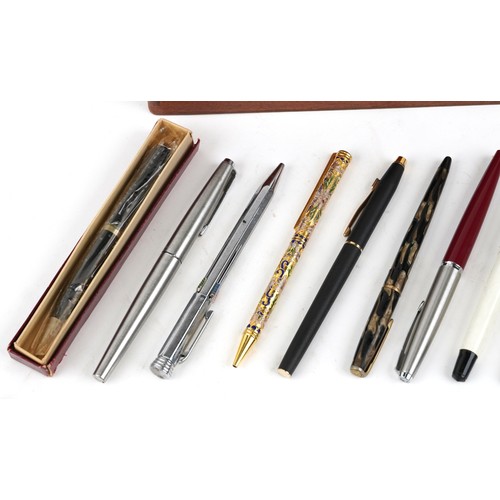 66 - Vintage and later fountain pens and ballpoint pens including Cross, Osmiroid and Conway Stewart.