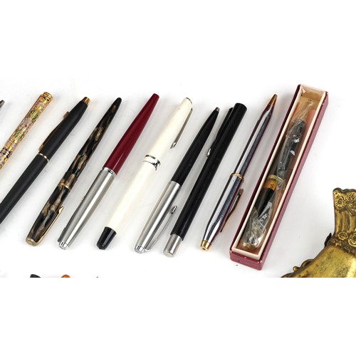 66 - Vintage and later fountain pens and ballpoint pens including Cross, Osmiroid and Conway Stewart.