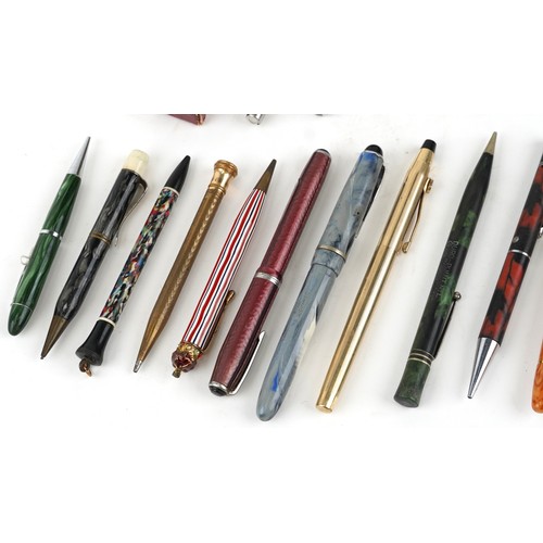 66 - Vintage and later fountain pens and ballpoint pens including Cross, Osmiroid and Conway Stewart.