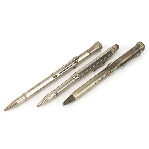76 - Three vintage silver plated combination pens, the largest 14cm in length.