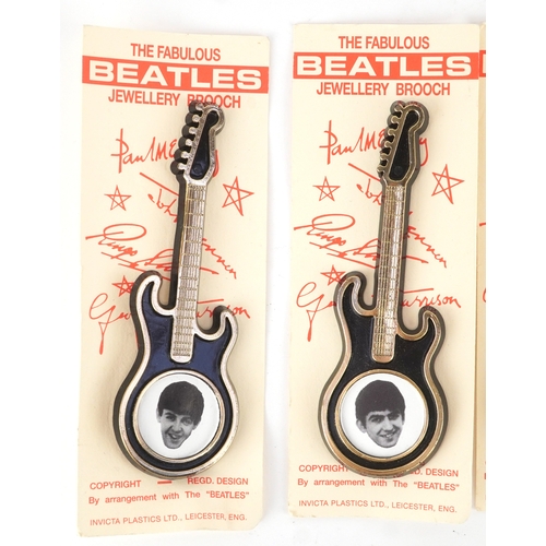 2635 - The Beatles, five novelty guitar brooches, 10.5cm in length.