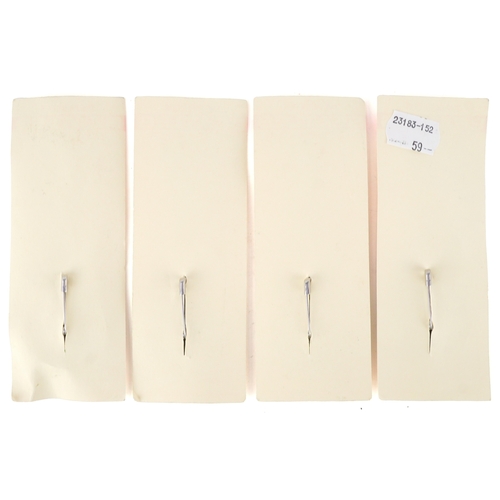 2635 - The Beatles, five novelty guitar brooches, 10.5cm in length.