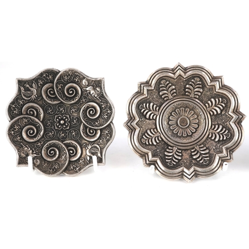 1834 - Three Chinese white metal dishes, each cast with floral decoration and animalia, the largest 12cm wi... 