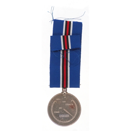 2702 - A military interest Submarine Service medal, unengraved