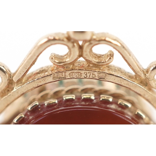3228 - A 9ct gold carnelian, bloodstone and onyx spinner fob, 1.8cm high together with an unmarked gold dia... 