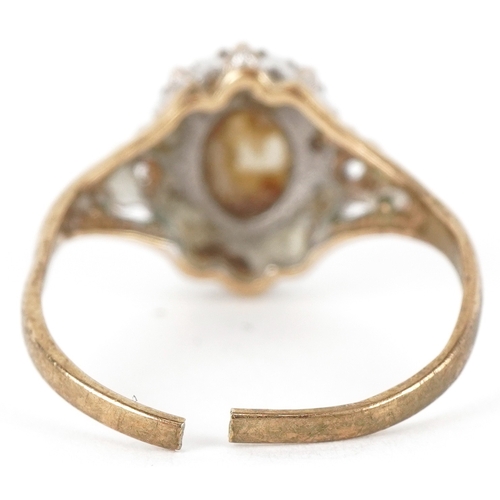 3138 - A 9ct gold cabochon opal and diamond cluster ring, size K, broken, 1.9g.