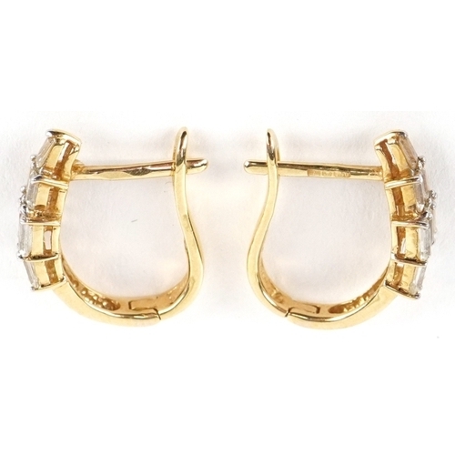 3047 - A pair of 18ct gold clear stone hoop earrings, 1.5cm high, total 2.8g.