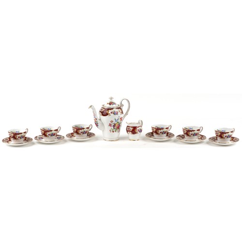 653 - A Royal Standard Lady Fayre patterned six place coffee service, the coffee pot 18cm high