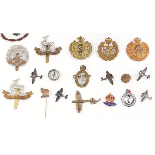 2826 - British militaria including a Christmas 1914 Mary tin, cap badges and a Metropolitan Police whistle.