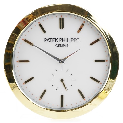 1517 - Patek Philippe design dealer's display wall clock, 40cm in diameter.