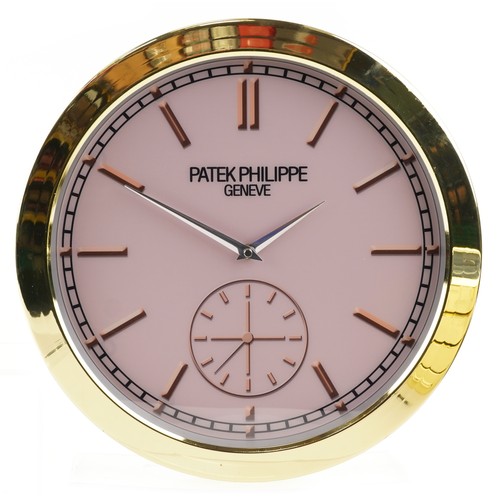 1542 - A Patek Philippe design dealer's display wall clock, 40cm in diameter.