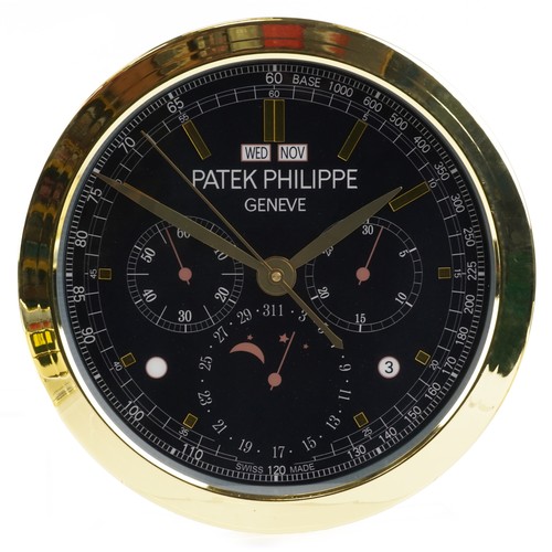 1612 - A Patek Philippe design dealer's display wall clock, 40cm in diameter.